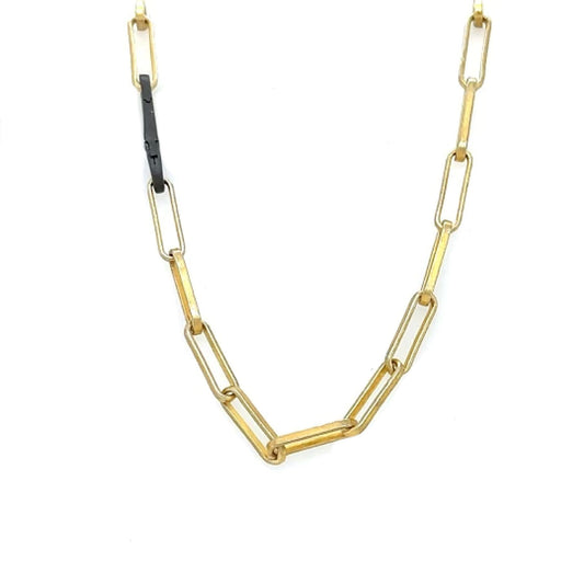 A lux chain for gold lovers! The even links of 18 kt gold plate brighten all skin tones and the oxidized silver paperclip connector adds that edge. Ideal as a single chain, but we love it layered with Talisman!