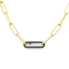 A lux chain for gold lovers! The even links of 18 kt gold plate brighten all skin tones and the oxidized silver paperclip connector adds that edge. Ideal as a single chain, but we love it layered with Talisman!
