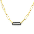 A lux chain for gold lovers! The even links of 18 kt gold plate brighten all skin tones and the oxidized silver paperclip connector adds that edge. Ideal as a single chain, but we love it layered with Talisman!