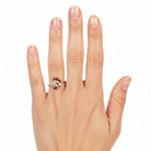 Diamond and ruby ring from the Chikahisa Ancestor Collection on a person