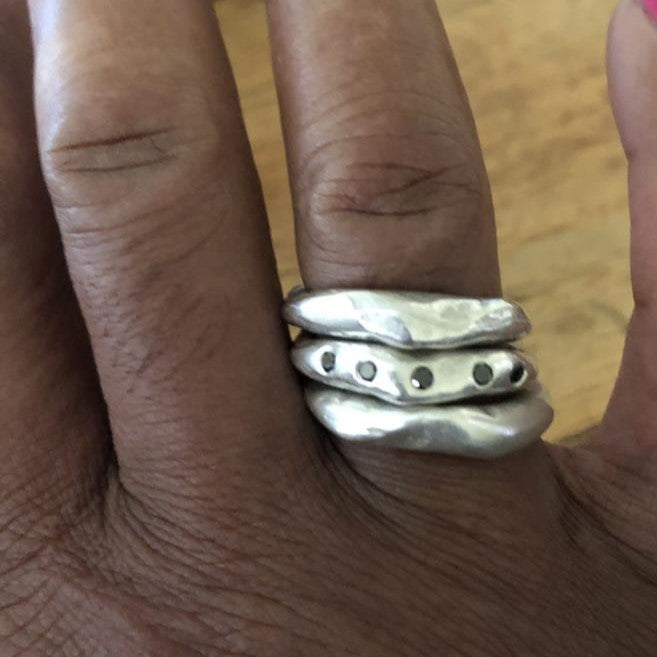 Close up of Connection Stacking Set on hand 