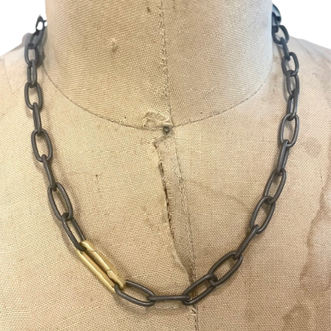 When you wear the Heavy Link Chain with Paper Clip Connector, you're immediately infused with a sense of cool confidence. There's a subtle rebellious thrill in wearing something so unconventional yet effortlessly chic. 