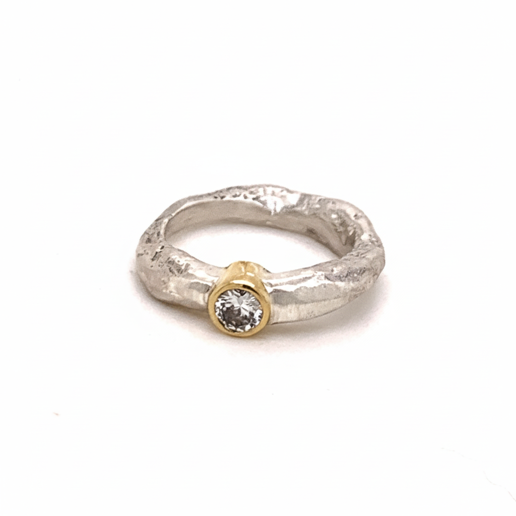 The Devotion Ring was designed for your life's journey in a beautiful and meaningful way. Made to celebrate the soul connection you have with yourself and with others. Each Devotion Ring is meticulously crafted with wabi-sabi intention, using only the finest precious metals and diamonds.
