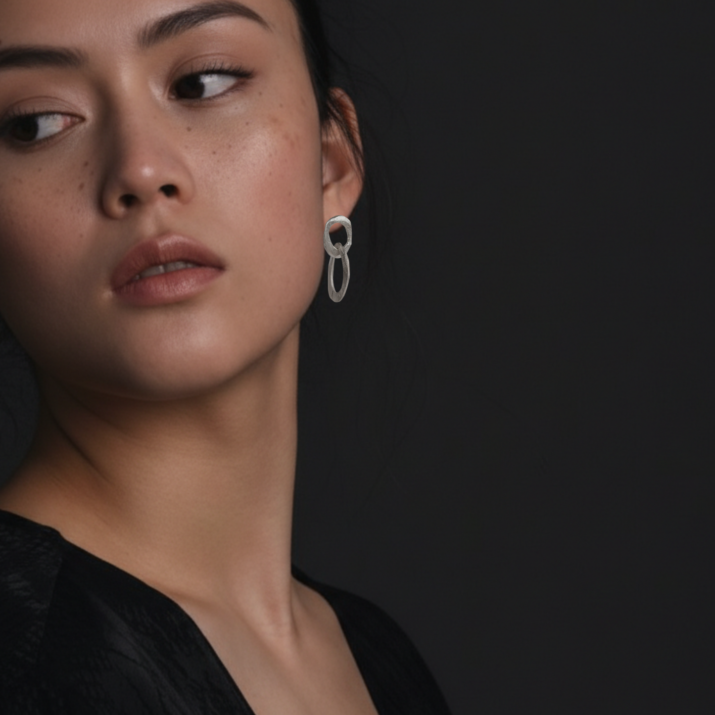 Double Oval Earrings in silver on model