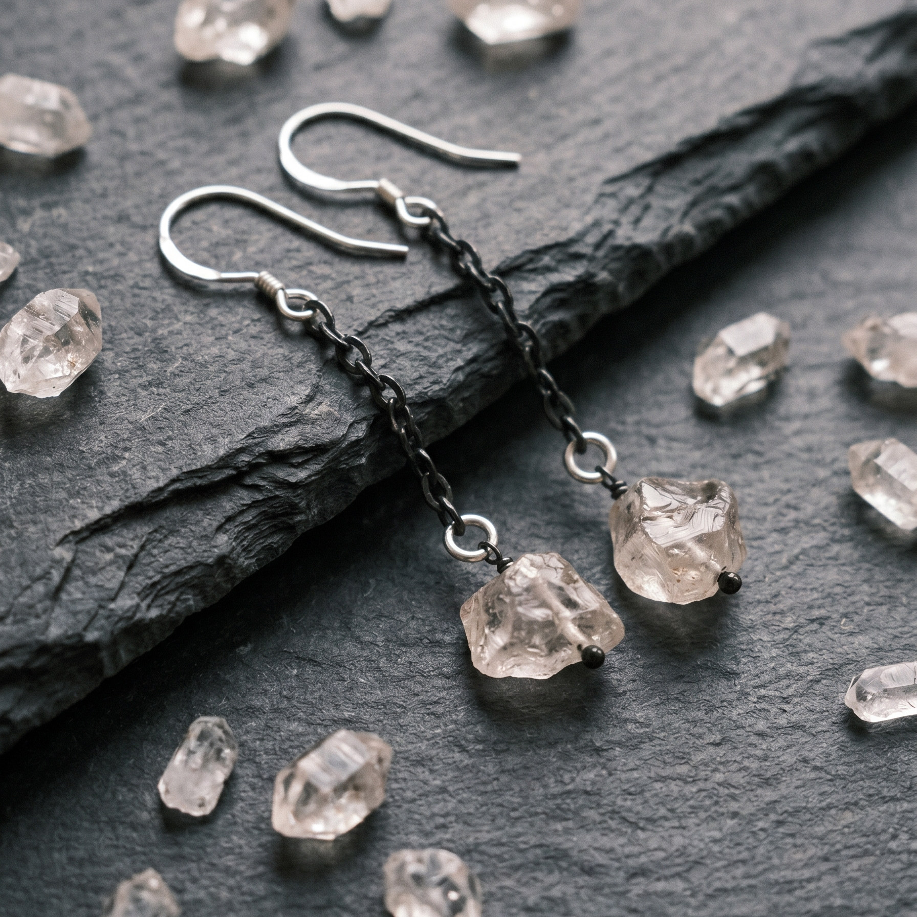 Fracture Earring on dark background up close
