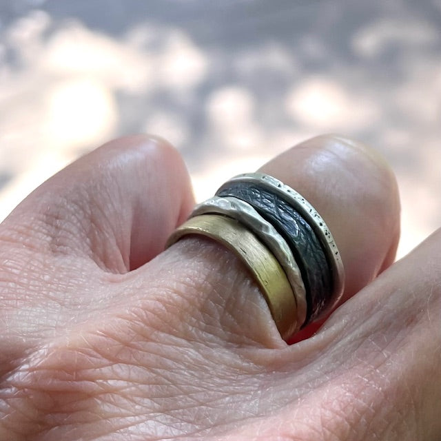 Elemental Harmony Ring Stack on persons hand