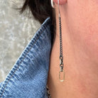 The Horizon Earrings are movement and light in harmony. An oxidized silver chain sways gracefully, ending in a luminous 18kt gold link that shines like the rising sun. They capture the essence of awakening - shadow giving way to brilliance.