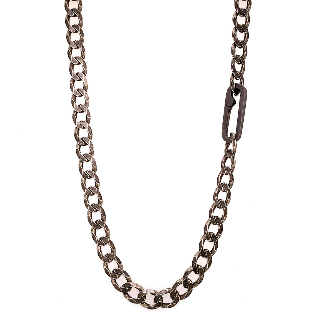 The large links, weight and texture of this flat curb chain have it all. This is the perfect chain to layer with other chains, wear solo, or use the Paperclip Connector & add a few of your favorite Talisman. 