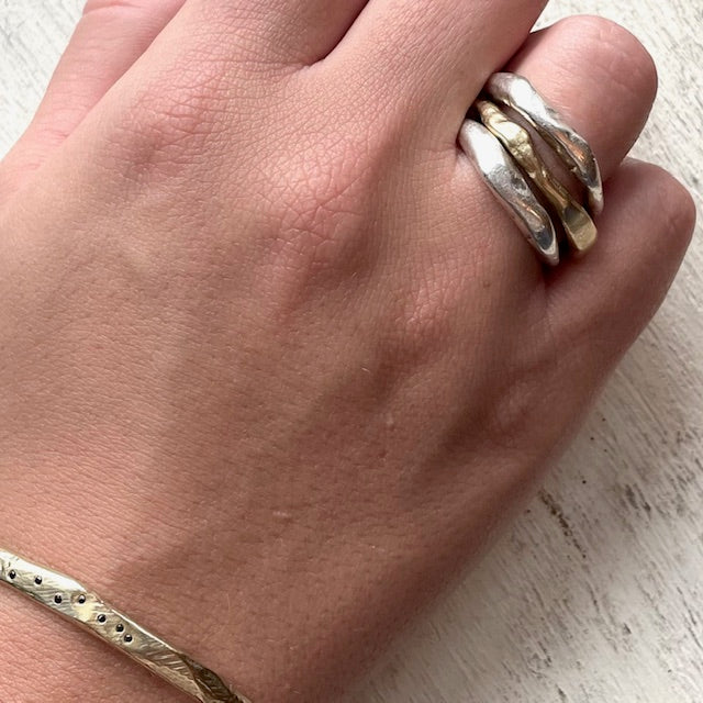 There's an ease you feel when you put on the Alchemist Ring Stack. It's like putting on the jeans you've had forever & will never part with. Each Ring is meticulously crafted with wabi-sabi intention, using only the finest precious metals. We use the ancient lost wax casting technique imbuing it with its own character and soulful imperfections that make it truly one of a kind. 