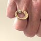 The Ovum Ring is a timeless and symbolic piece perfect for anyone looking to manifest a new chapter in their life. Ovals have been used to represent rebirth since ancient times, and this ring is no exception.  Its sleek design features a perfectly shaped oval with a bezel set white diamond. It's a powerful symbol and a reminder that no matter what happens in life, there is always a chance for renewal and growth.