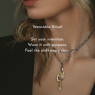 Model wearing Rooted, Peace and Love Talisman with text of Wearable Ritual meaning.