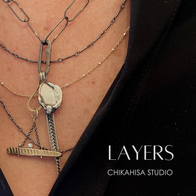 A delicate and stunning necklace! Get the look of layers in one simple beauty. 