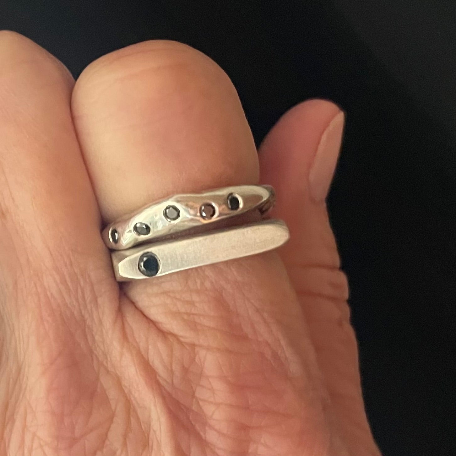 Lunar Eclipse Ring in Silver with the Constellation Ring in silver shown on a person
