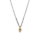 In ancient Japan, warriors and travelers carried mamori - sacred talismans believed to ward off harm and channel protective energies. Our Mamori Talisman carries this centuries old intention into a modern heirloom, bridging worlds through deliberate design and precious materials.
