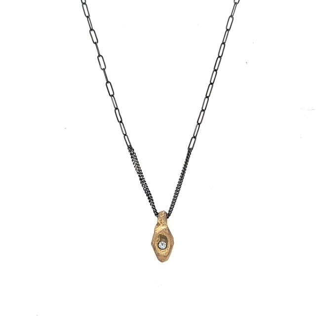 In ancient Japan, warriors and travelers carried mamori - sacred talismans believed to ward off harm and channel protective energies. Our Mamori Talisman carries this centuries old intention into a modern heirloom, bridging worlds through deliberate design and precious materials.