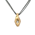 In ancient Japan, warriors and travelers carried mamori - sacred talismans believed to ward off harm and channel protective energies. Our Mamori Talisman carries this centuries old intention into a modern heirloom, bridging worlds through deliberate design and precious materials.