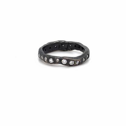 The Mystic Radiance Ring is a luminous ring of white diamonds set in oxidized silver. Inspired by starlight and transformation. Your inner light, revealed.