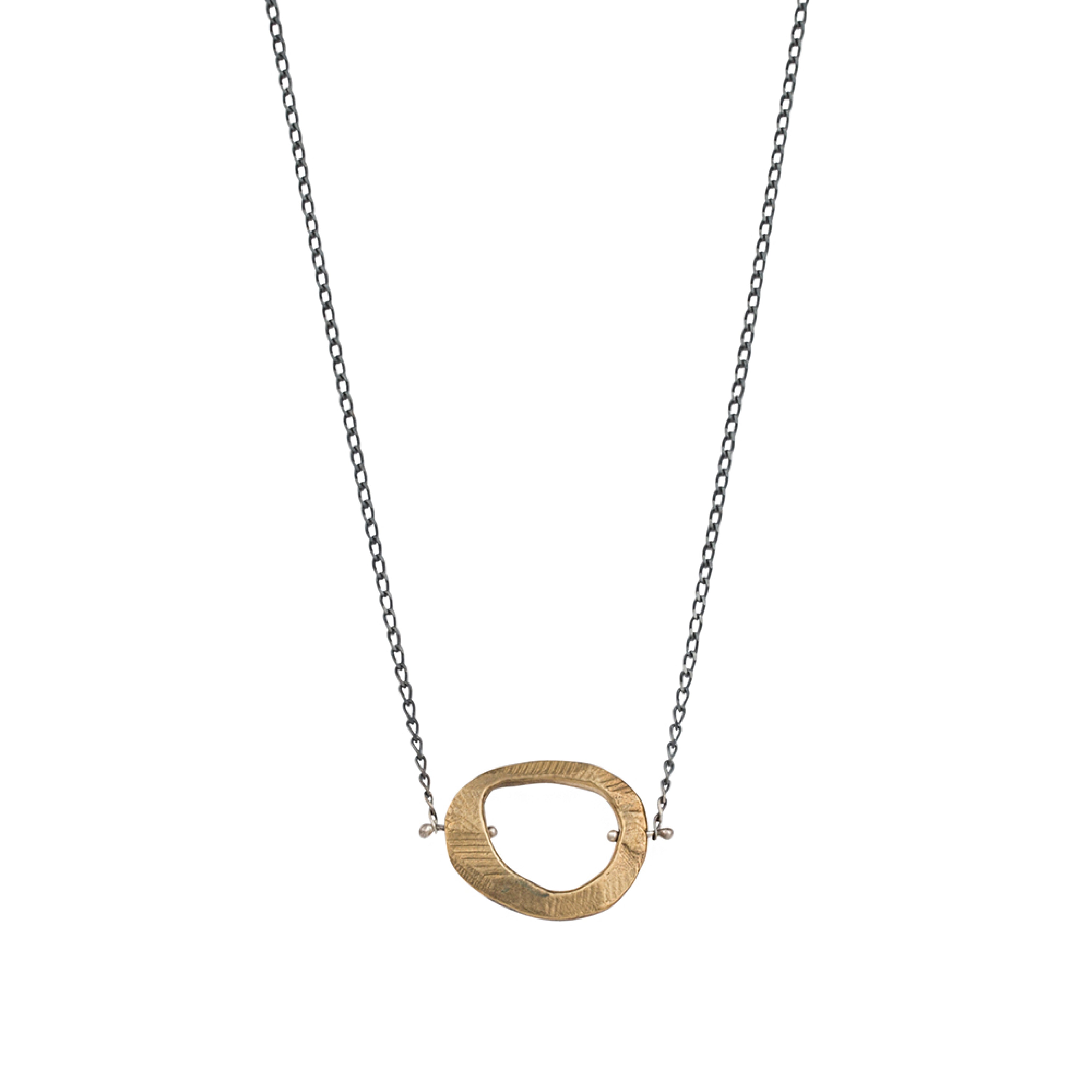 The Skipping Stones Simple Necklace in Bronze is the essential necklace to layer or wear solo for an effortless style. 