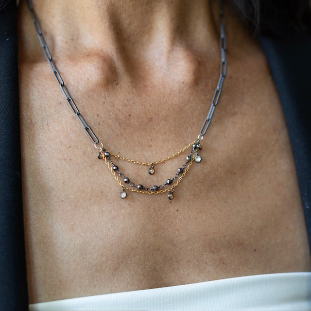 The Mixed Metal Sparkle Necklace from our Sacred Bloom Collection mixes metals, movement, interest and a glimpse of sparkle. Reflect your inner shine - be refined, be radiant, be you.