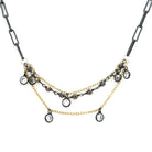 The Sparkle Necklace captures the essence of personal growth and inner radiance. It features a harmonious blend of mixed metals, creating a dynamic interplay of tones that symbolize life's diverse experiences. Delicate lotus-inspired elements are interspersed with subtle sparkles, adding movement and light to the design.