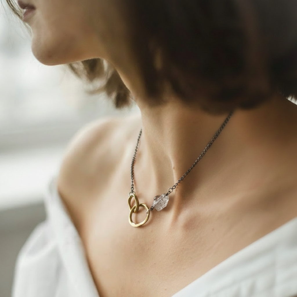Close up of Found Necklace from Unbroken Collection on Model