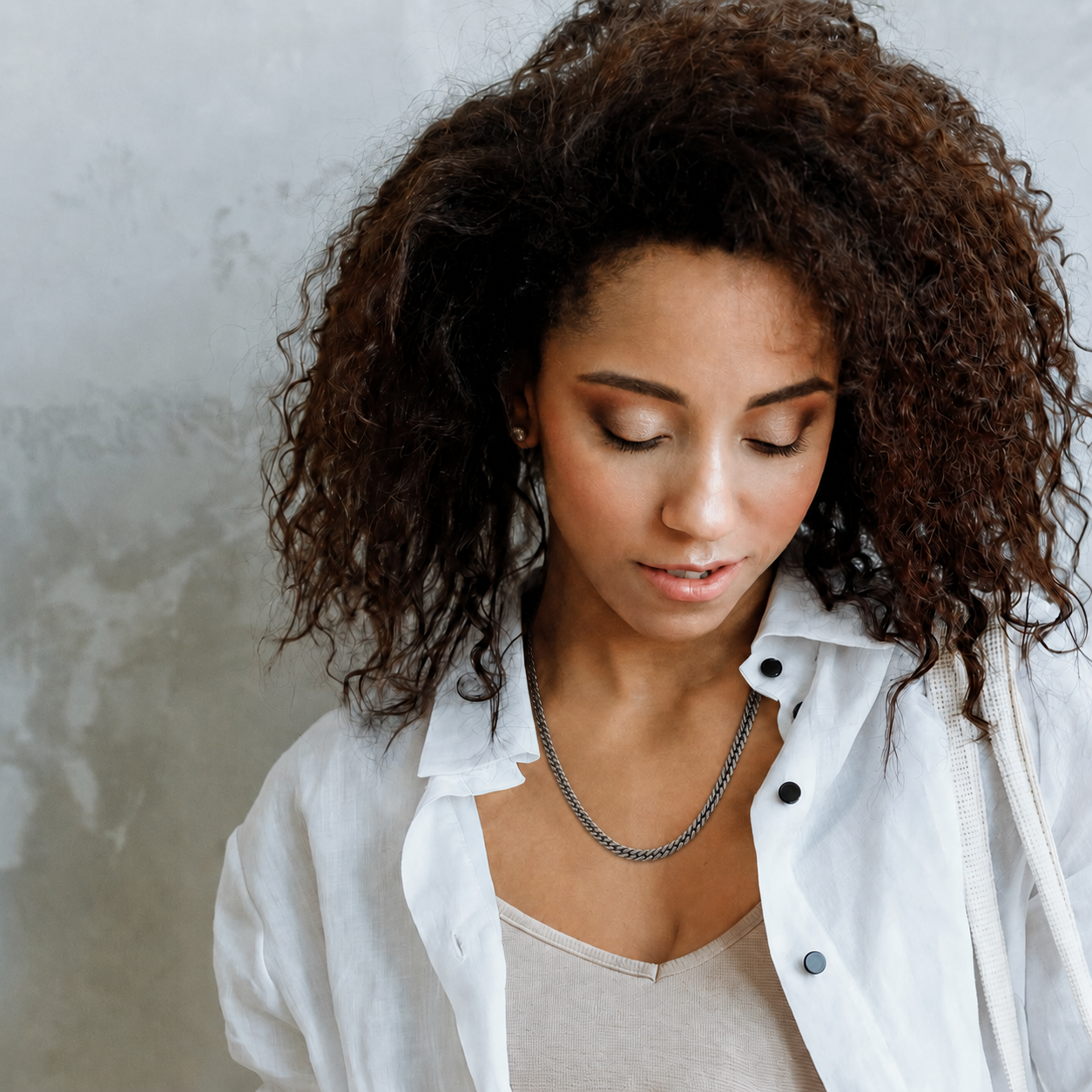 Hold Necklace on female model