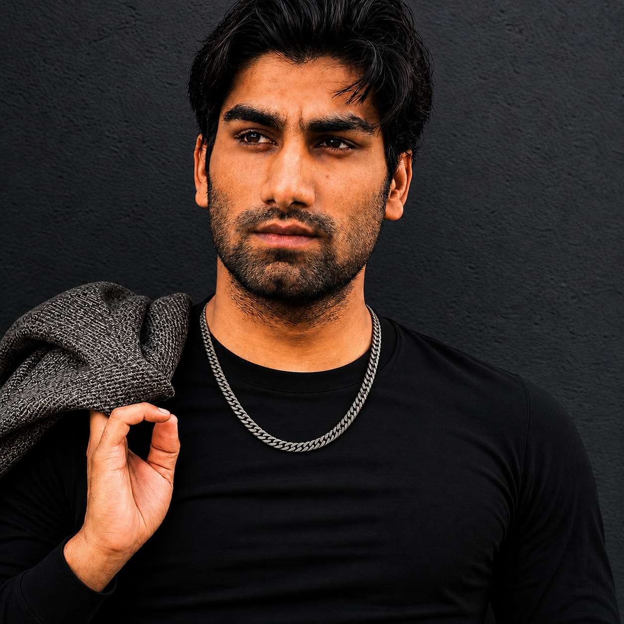 Hold Necklace on male model