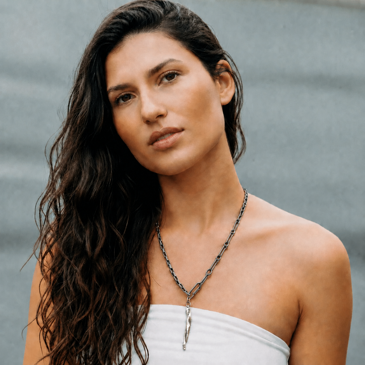 Link Necklace with Strength Talisman Pendant on female model