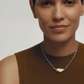 Model wearing Vestige Necklace in Bronze