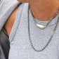 Vestige Necklace in Silver Layered with Spark Chain Necklace on a person 