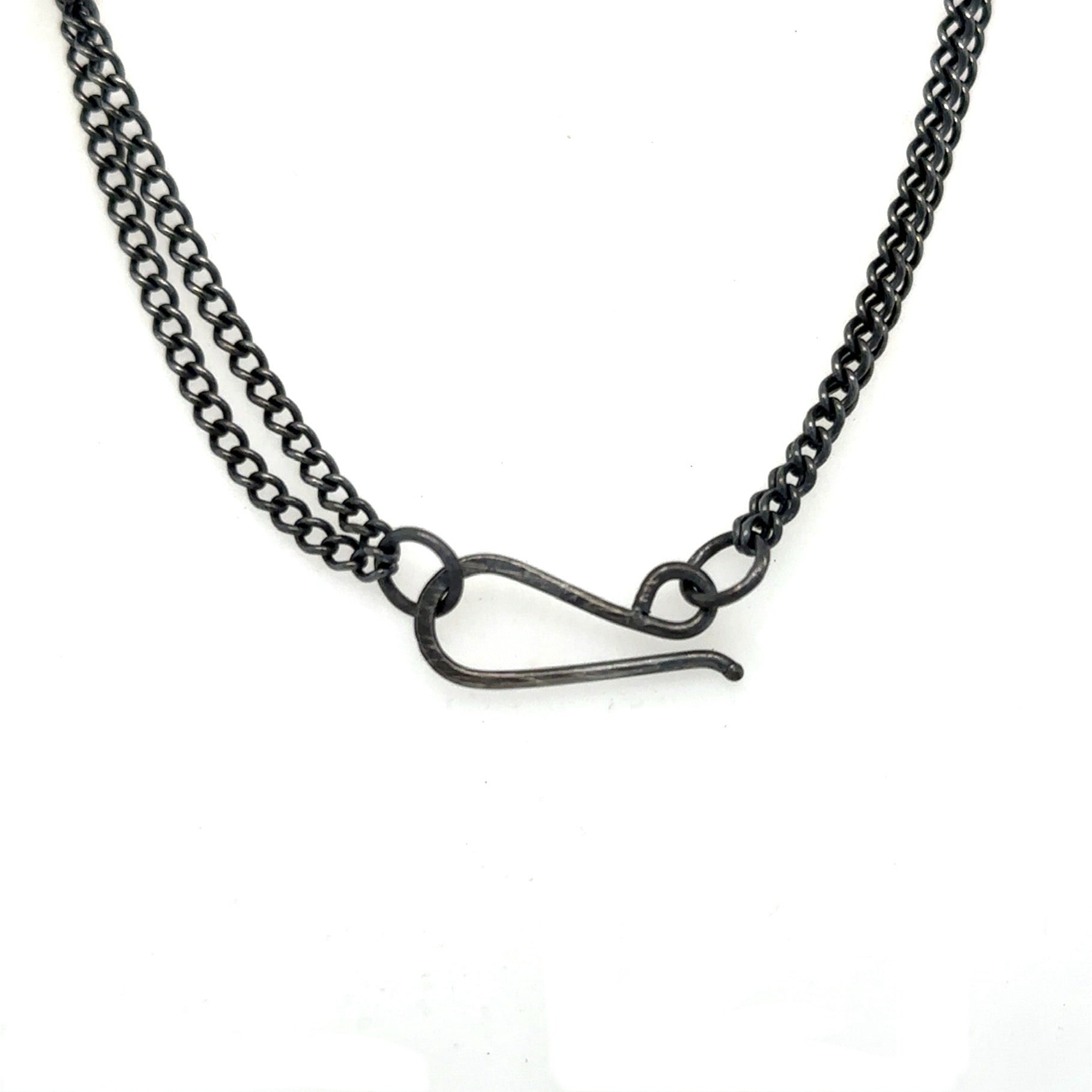 Close up of closure on the Whisper necklace