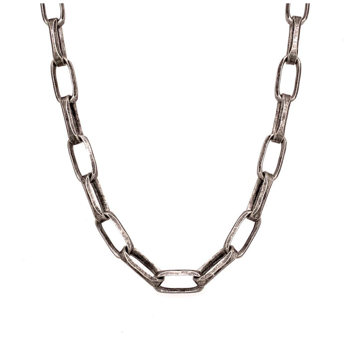 This sophisticated chain is made of solid sterling silver and the weight of it is luxurious. It has a brushed oxidized silver finish.  Links are 3/8" in size