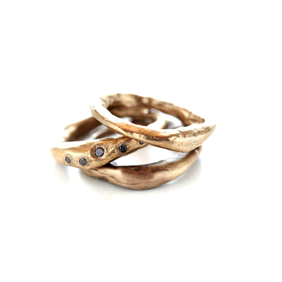 The Connection Stacking Ring Set embraces the beauty of the past, present, and future. It's inspired by our collective desire to connect with something greater than ourselves. 