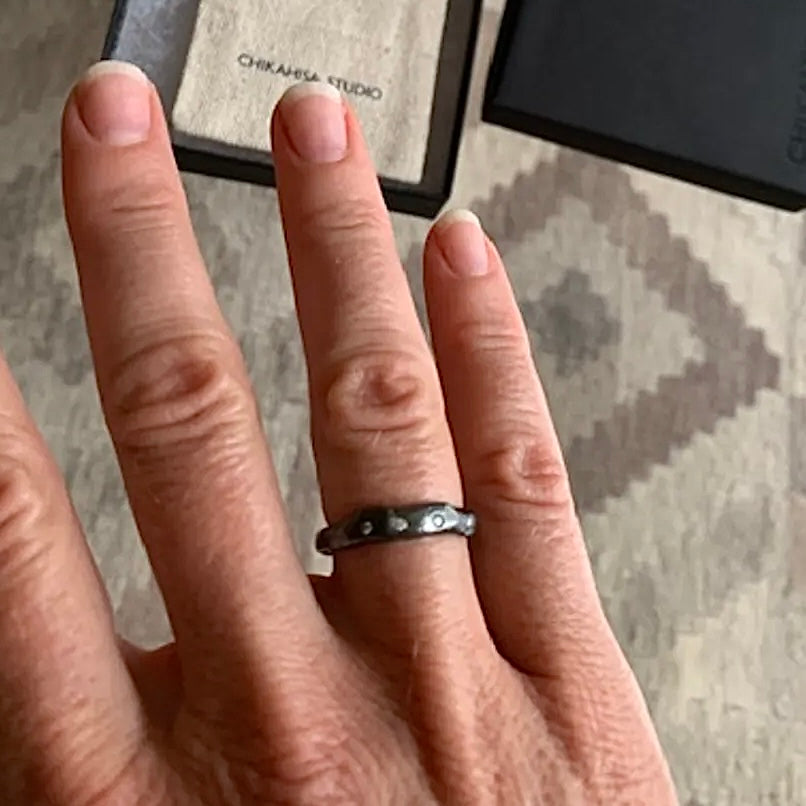 The Deep Mystic Ring with Diamonds is a sculptural addition to any ring stack! The art of wabi-sabi is reflected in its organic shape, texture and dark oxidized finish. Reminding us of the beauty found in imperfection. 