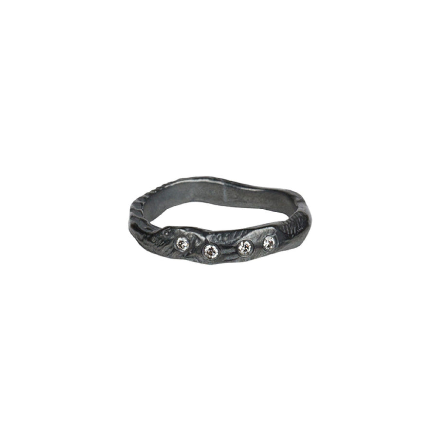 The Deep Mystic Ring with Diamonds is a sculptural addition to any ring stack! The art of wabi-sabi is reflected in its organic shape, texture and dark oxidized finish. Reminding us of the beauty found in imperfection. 