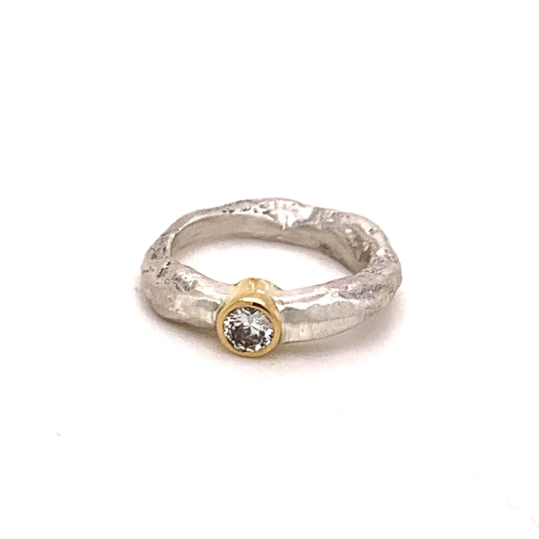 The Devotion Ring was designed for your life's journey in a beautiful and meaningful way. Made to celebrate the soul connection you have with yourself and with others. Each Devotion Ring is meticulously crafted with wabi-sabi intention, using only the finest precious metals and diamonds.