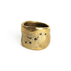 The Five Elements Ring is a stunning tribute to the five elements of nature - water, wood, fire, earth and metal. The unique and meaningful design features five black diamonds, representing each element and its significance in Japanese culture. Handcrafted with a wide band that is deceptively comfortable, this ring is designed to be worn every day as a reminder to stay present and connected to the planet. 