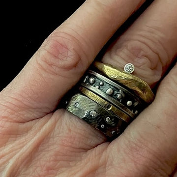 Skout's Ring Stack is all about combining texture and color. It says, I'm not afraid to mix things up and wear a stack that is unique.. just like me! Stack them high, like Skout, or wear them solo. Each ring... Odyssey, Seek, Ritual, and Venus is a stand alone beauty that you will always love.