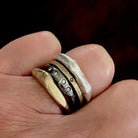 The Deep Mystic Ring with Diamonds is a sculptural addition to any ring stack! Other rings featured in stack Element Rings in Silver and Bronze and Ritual Ring in Bronze.