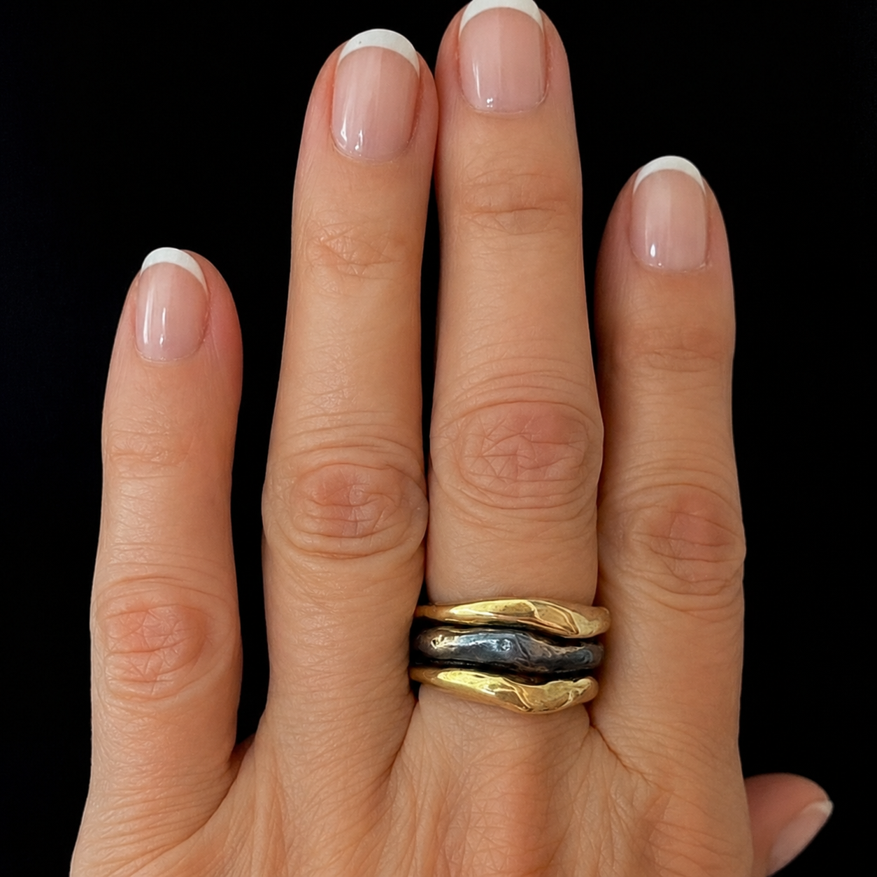 Alchemist Ring Stack Combo 3 on persons hand