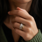 Ring Stack on model: Thrive, Devotion in Silver with white diamond, and Constellation in Bronze with black diamond
