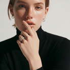 Odyssey ring in sterling silver with Channel ring in bronze on model 