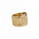 The Relic Ring sets a reminder to dive fearlessly and discover the treasure that lies inside you. It's the perfect ring to help you feel confident and empowered.  With a wide band (which is deceptively comfortable) and bezel set white diamond it makes the Relic Ring a modern antiquity. One that you will wear everyday!