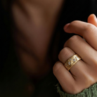 Thrive Ring in bronze with salt and pepper diamonds on model