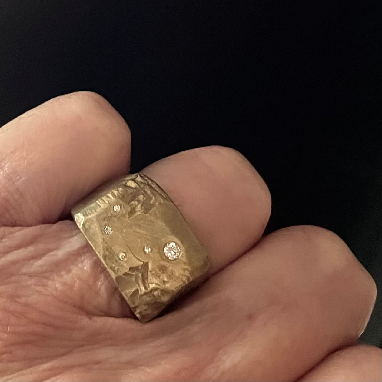 Stargazer Ring in Bronze on persons hand 
