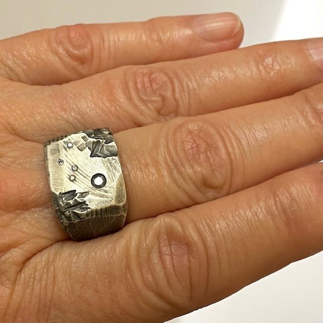 Stargazer Ring in Silver on persons hand