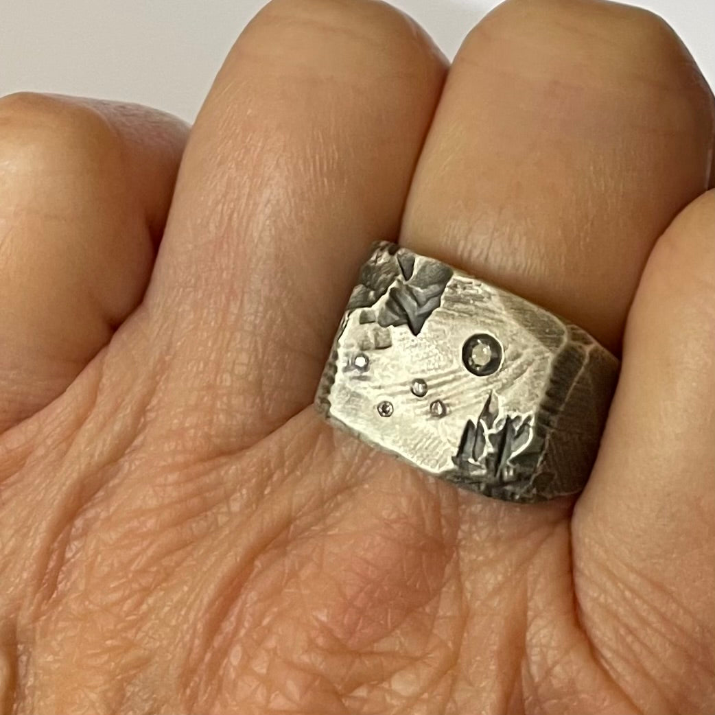 Stargazer Ring in Silver on Persons Hand