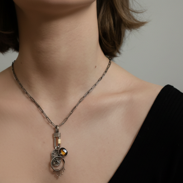Model wearing assorted talisman on the Layered Black Silver and GF Chain