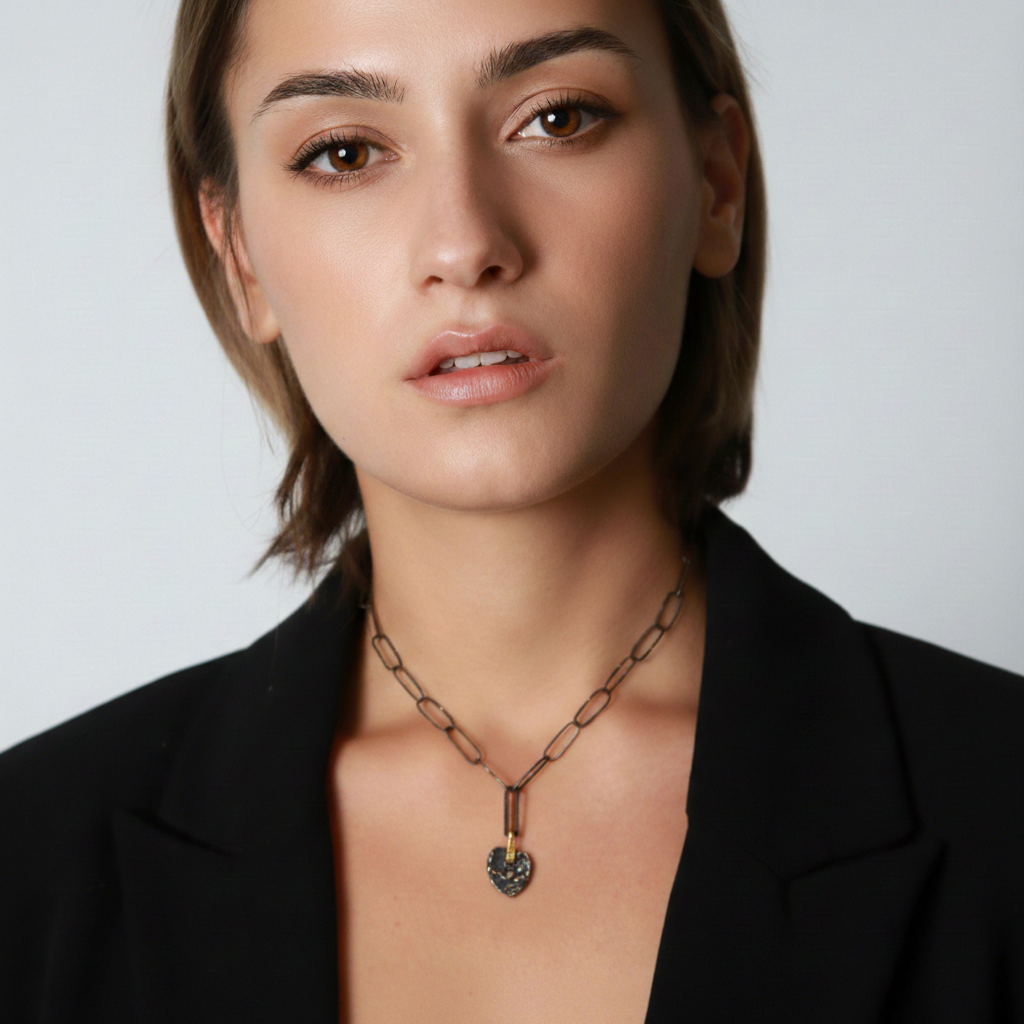 Model wearing OXS Paper Clip Chain with the Love Talisman in Silver