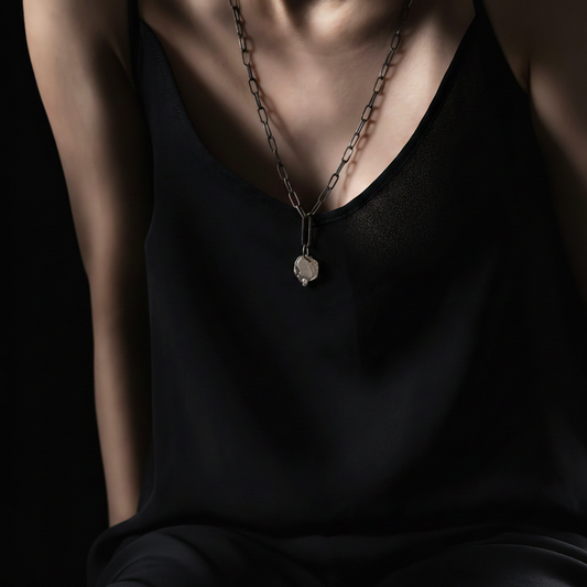 Model wearing Reflection Talisman on OXS Chain